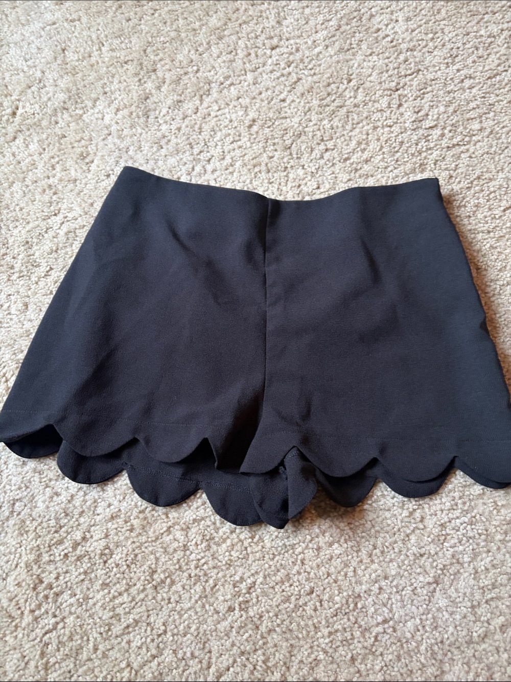 Feminine Black Scalloped Hem Skort with Flared Silhouette